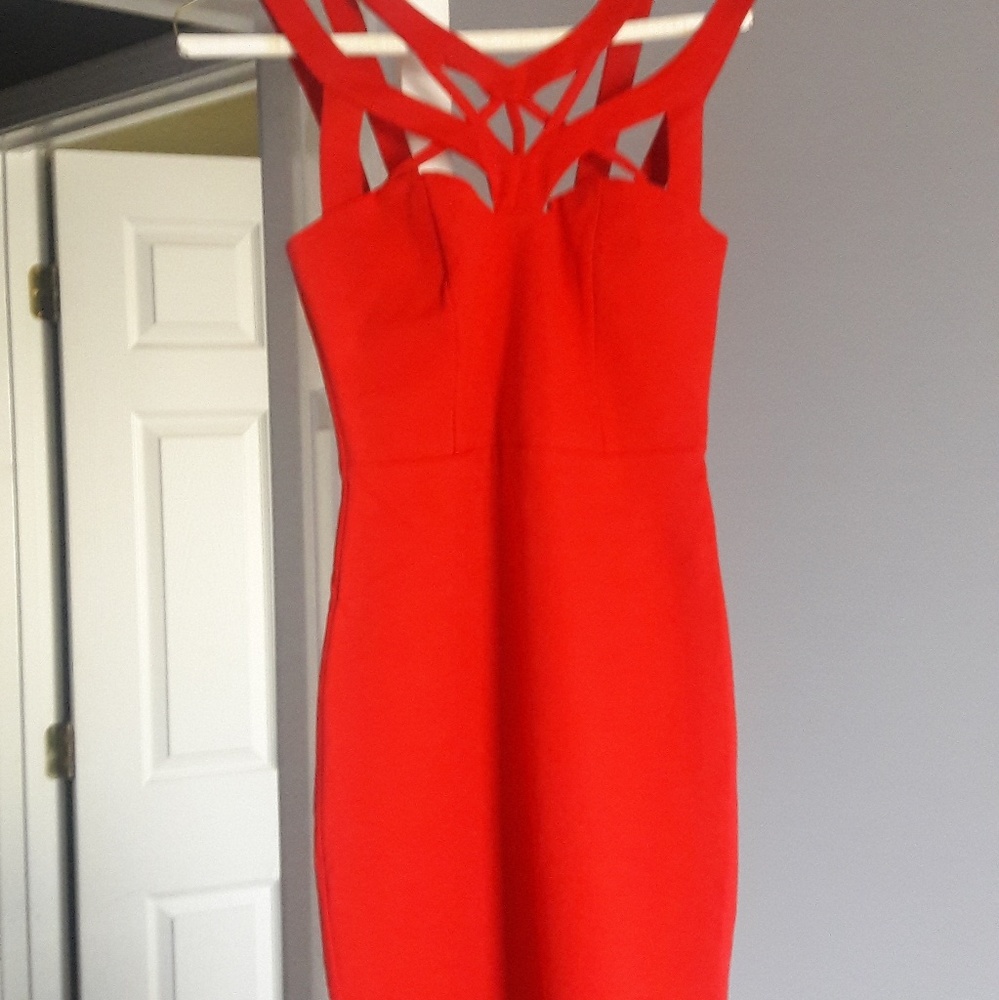 Hot fire strappy red dress! Fits like an XS